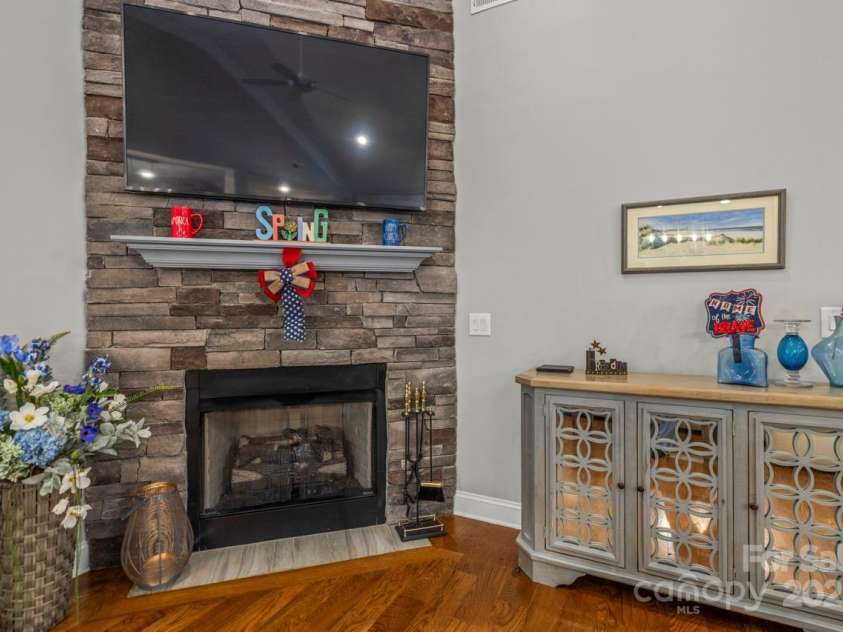 1150 Golden Hill Lane, Denver, NC 28037.  MLS# CAR4278089, YatesRealty ID 25650. Stone fireplace in the great room with gas log fireplace