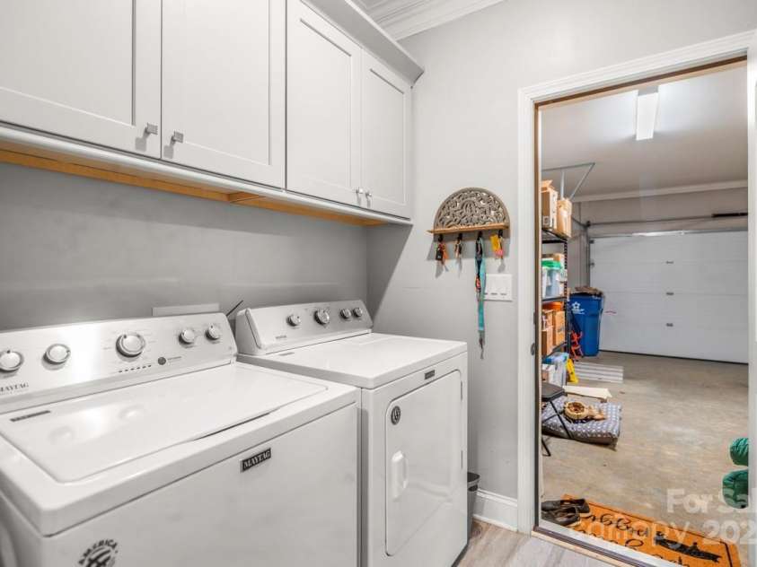 1150 Golden Hill Lane, Denver, NC 28037.  MLS# CAR4278089, YatesRealty ID 25650. The laundry room is ideally situated off of the garage and features added cabinetry