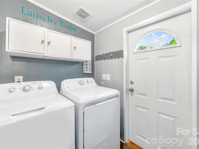 139 Gayle Drive, Troutman, NC 28166.  MLS# CAR4375168, YatesRealty ID 25654. Laundry room off the kitchen