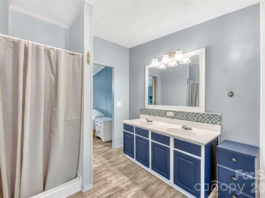 139 Gayle Drive, Troutman, NC 28166.  MLS# CAR4375168, YatesRealty ID 25654. Master shower