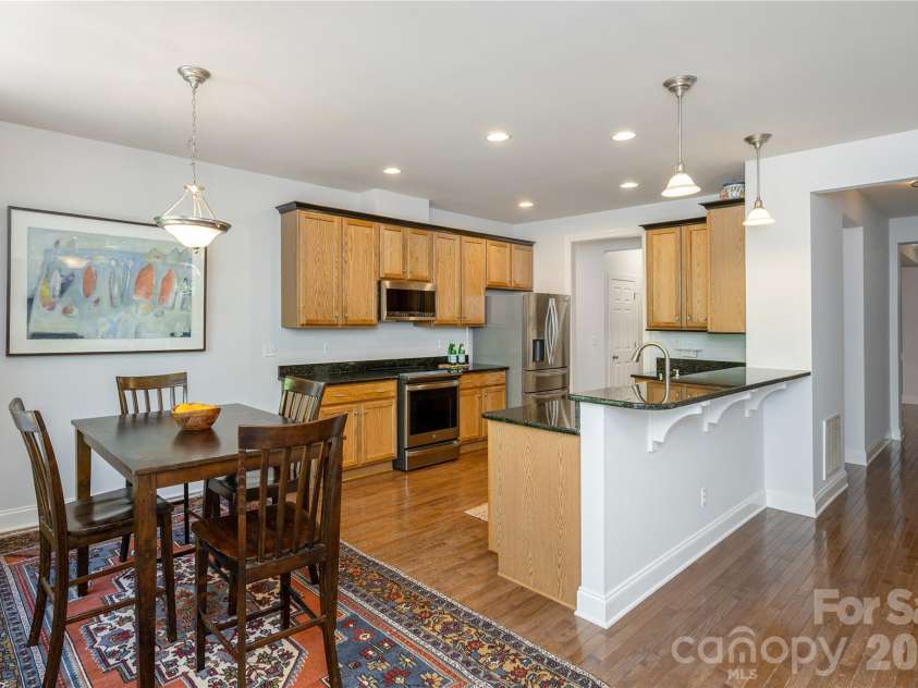 5 Hoolet Court, Biltmore Lake, NC 28715.  MLS# CAR4372678, YatesRealty ID 25665. Dining area and bar