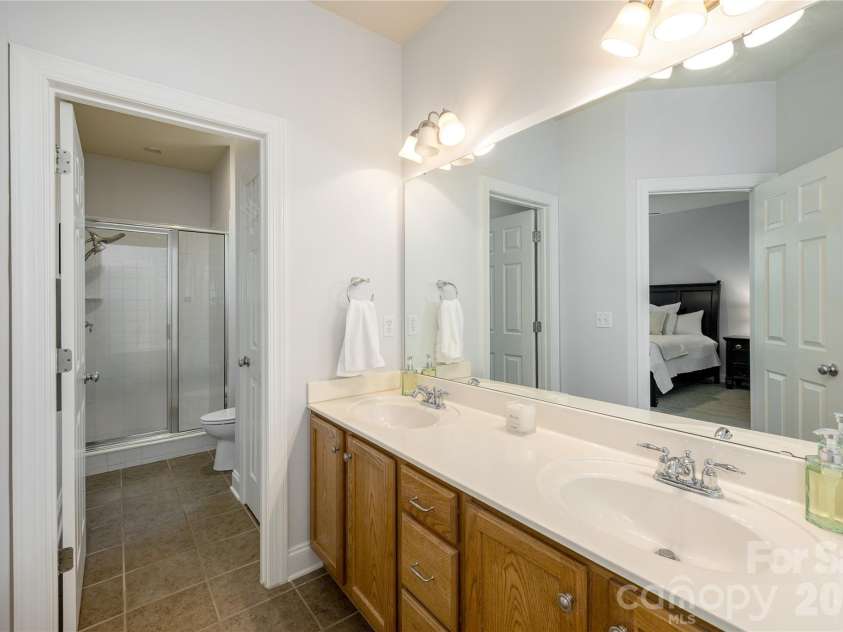 5 Hoolet Court, Biltmore Lake, NC 28715.  MLS# CAR4372678, YatesRealty ID 25665. Primary bathroom with separate shower