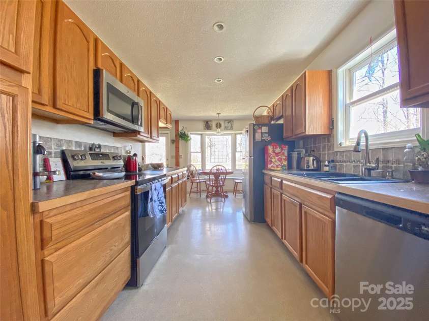 1208 Kanuga Ridge Road, Hendersonville, NC 28739.  MLS# CAR4216501, YatesRealty ID 25667. 