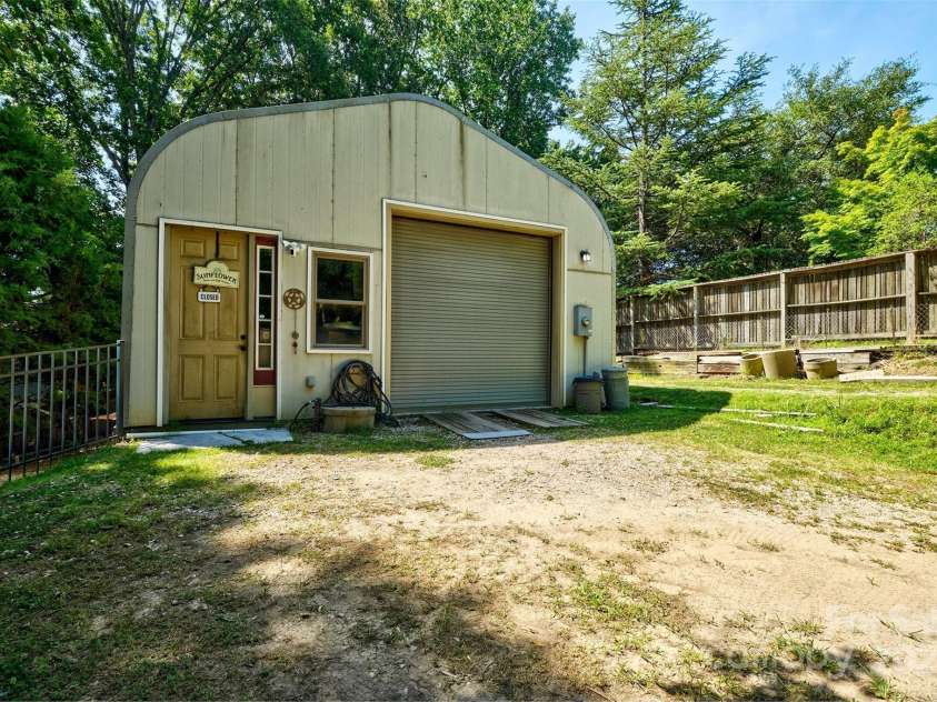 5390 Hudson Road, Lake Wylie, SC 29710.  MLS# CAR4274275, YatesRealty ID 25672. Garage with workshop that is heated and cooled