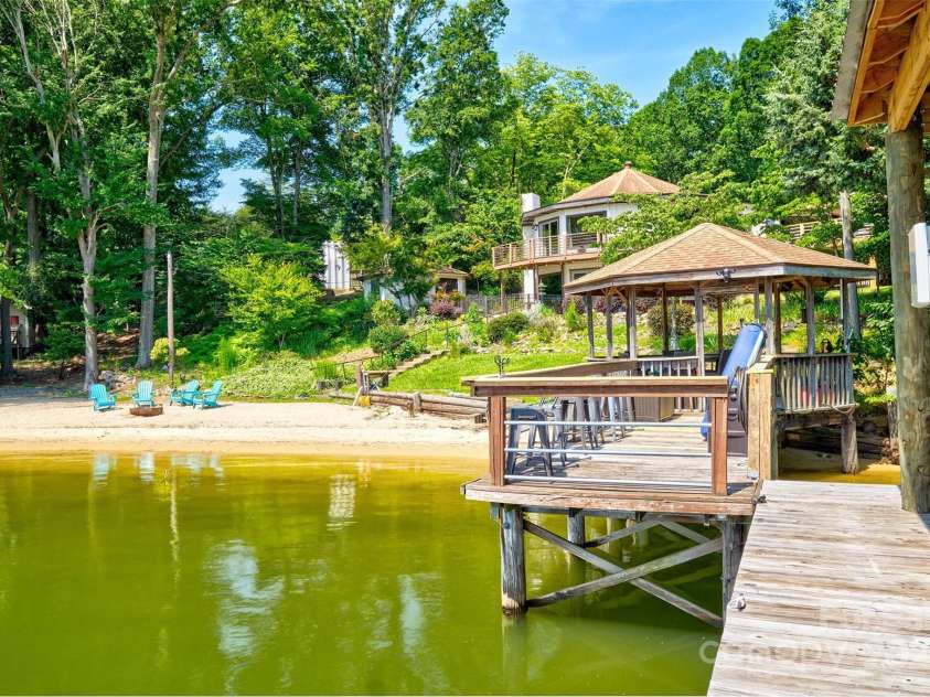5390 Hudson Road, Lake Wylie, SC 29710.  MLS# CAR4274275, YatesRealty ID 25672. View of home from dock