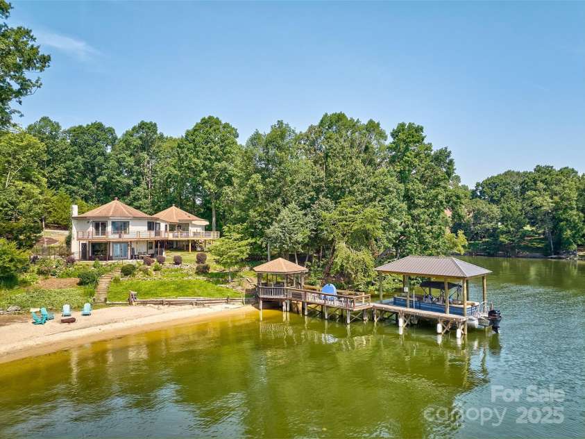 5390 Hudson Road, Lake Wylie, SC 29710.  MLS# CAR4274275, YatesRealty ID 25672. View of home from water