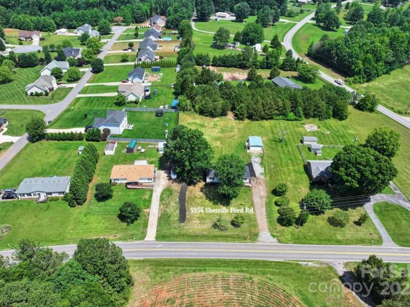 5354 Sherrills Ford Road, Catawba, NC 28609.  MLS# CAR4268743, YatesRealty ID 25674. Aerial view showing space between houses