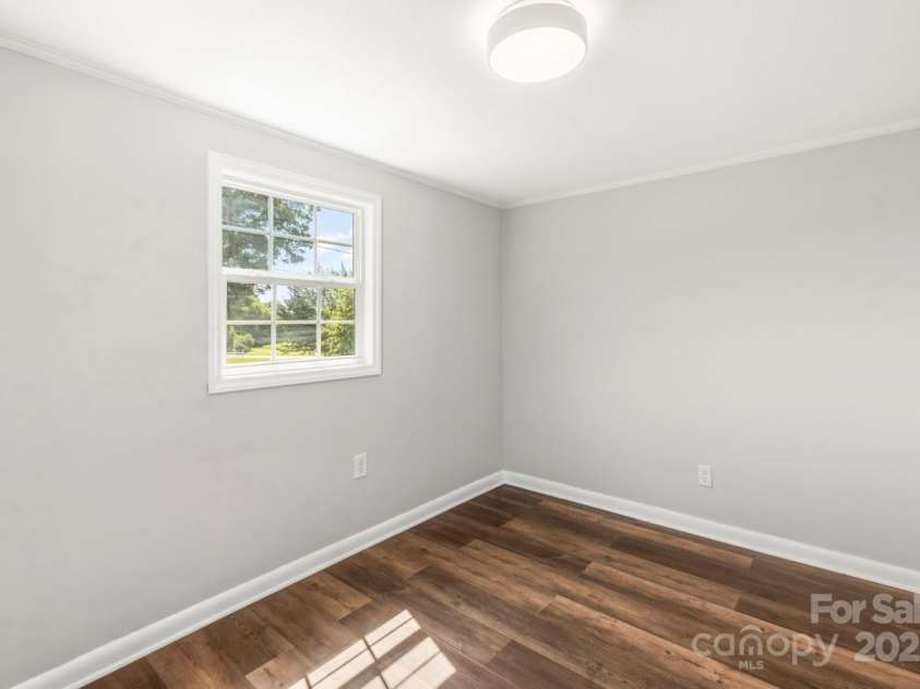 5354 Sherrills Ford Road, Catawba, NC 28609.  MLS# CAR4268743, YatesRealty ID 25674. Bedroom 2 with new paint seen throughout