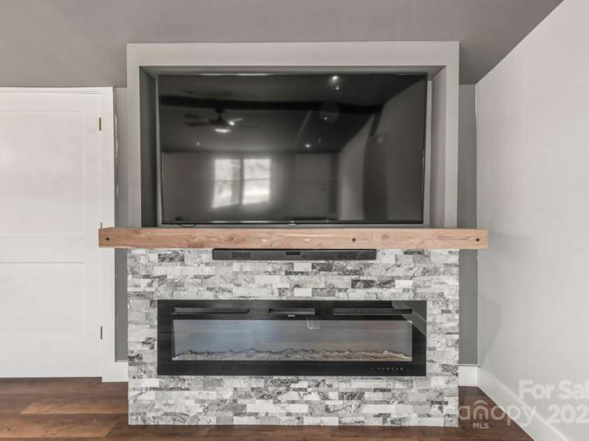 5354 Sherrills Ford Road, Catawba, NC 28609.  MLS# CAR4268743, YatesRealty ID 25674. Captivating fireplace with TV niche