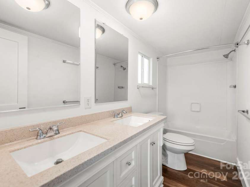 5354 Sherrills Ford Road, Catawba, NC 28609.  MLS# CAR4268743, YatesRealty ID 25674. Furniture style vanity in primary Bath with tub/shower insert