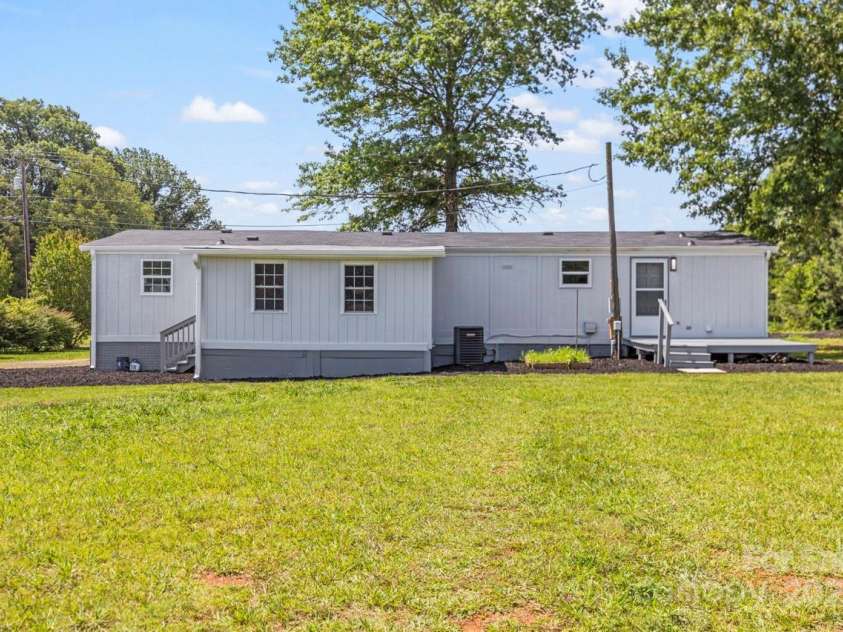 5354 Sherrills Ford Road, Catawba, NC 28609.  MLS# CAR4268743, YatesRealty ID 25674. Rear view of home with a roof installed in 2019