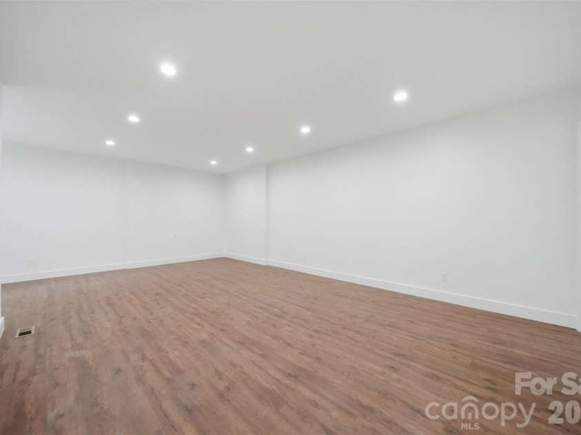 414 Scarlett Oak Court, Lenoir, NC 28645.  MLS# CAR4385390, YatesRealty ID 25675. The finished basement has so much space.