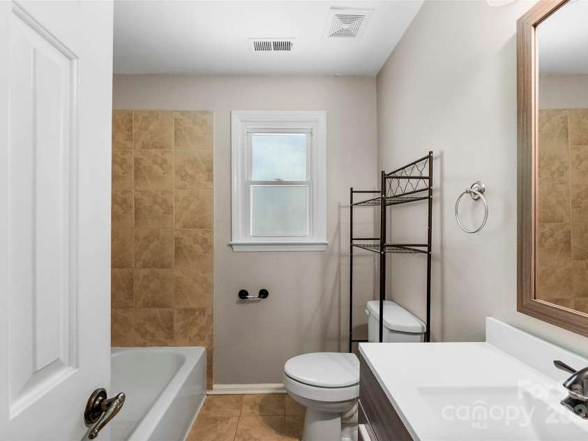 14402 Raynham Drive, Charlotte, NC 28262.  MLS# CAR4268473, YatesRealty ID 25677. 