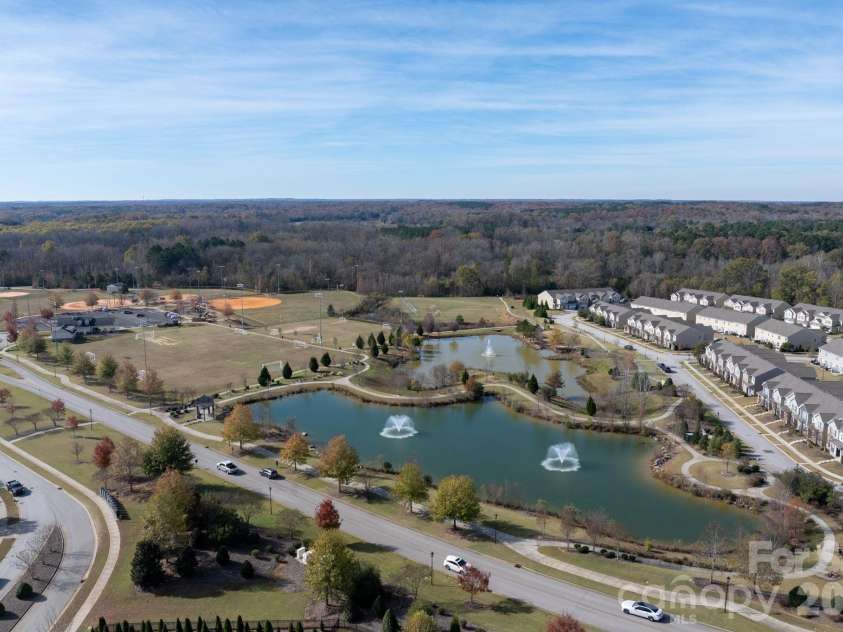 2032 Pinyon Lane, Lancaster, SC 29720.  MLS# CAR4369773, YatesRealty ID 25677. Community Pond + Public Park