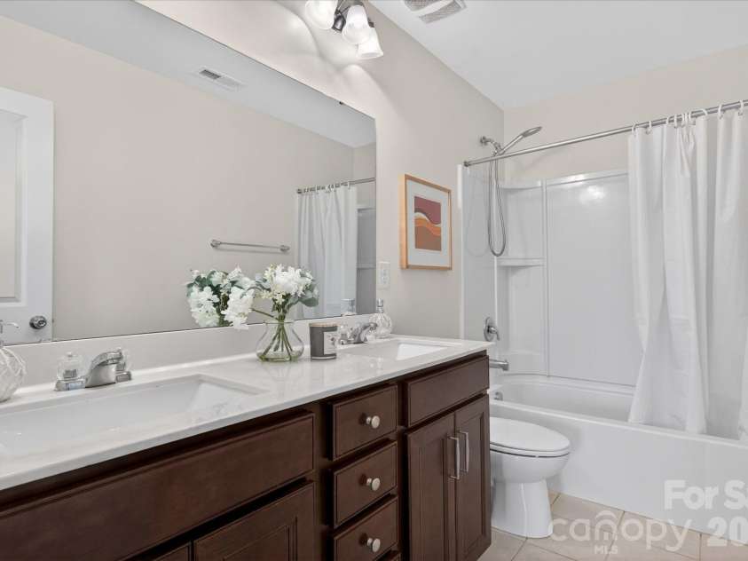 2032 Pinyon Lane, Lancaster, SC 29720.  MLS# CAR4369773, YatesRealty ID 25677. Hallway Bath with Dual Vanity