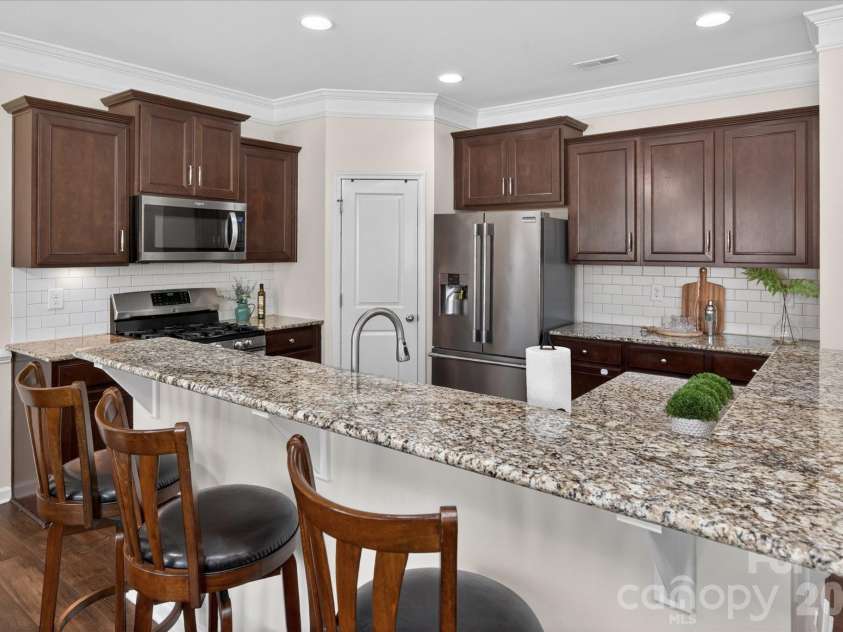 2032 Pinyon Lane, Lancaster, SC 29720.  MLS# CAR4369773, YatesRealty ID 25677. Walk In Pantry + Bar Seating