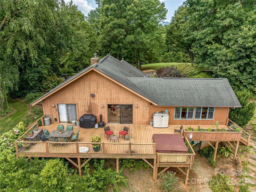 703 Crestview Drive, Leicester, NC 28748.  MLS# CAR4055999, YatesRealty ID 2568. 1986 3/3 Cottage with bonus room and excellent views!