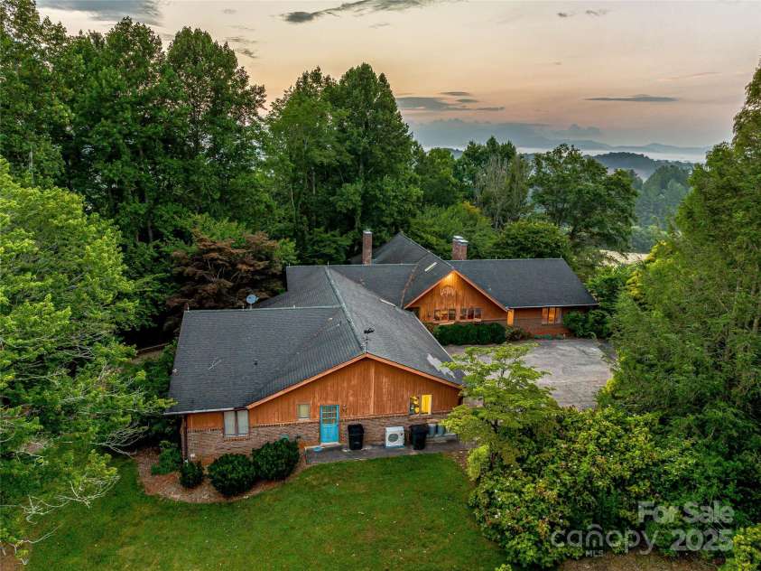 703 Crestview Drive, Leicester, NC 28748.  MLS# CAR4055999, YatesRealty ID 2568. 6 Bedroom 6 Bath Main House built in 1983