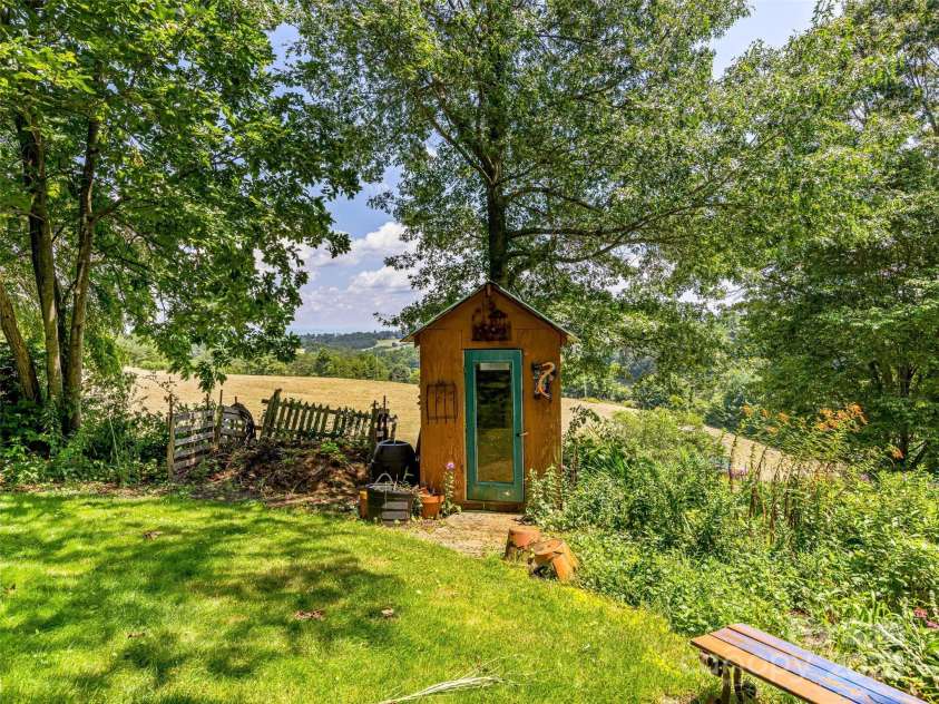 703 Crestview Drive, Leicester, NC 28748.  MLS# CAR4055999, YatesRealty ID 2568. Beautiful outdoor spaces to enjoy.