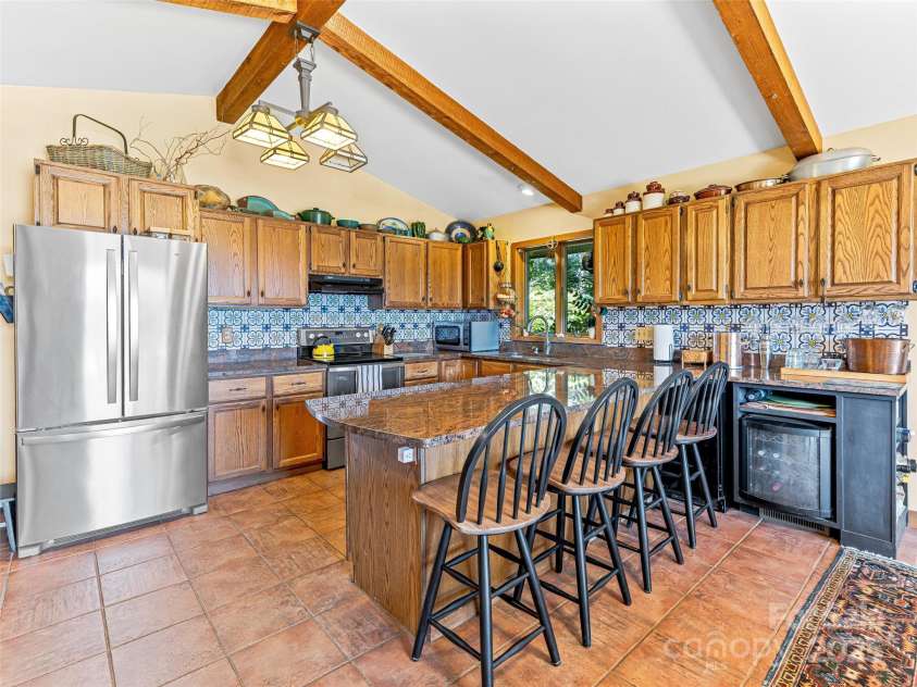 703 Crestview Drive, Leicester, NC 28748.  MLS# CAR4055999, YatesRealty ID 2568. Cottage with excellent views!