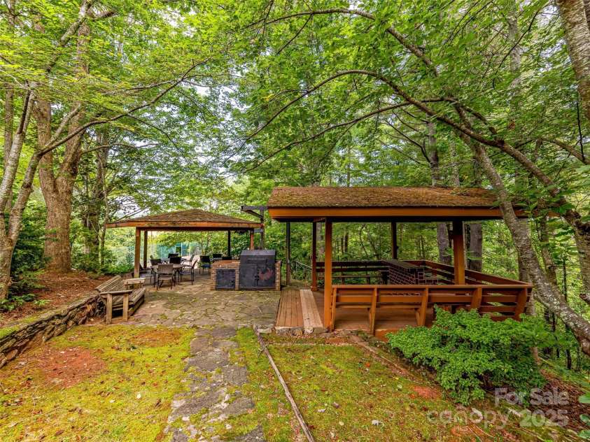 703 Crestview Drive, Leicester, NC 28748.  MLS# CAR4055999, YatesRealty ID 2568. Covered BBQ pavilion with smoker bar area and gazebo 