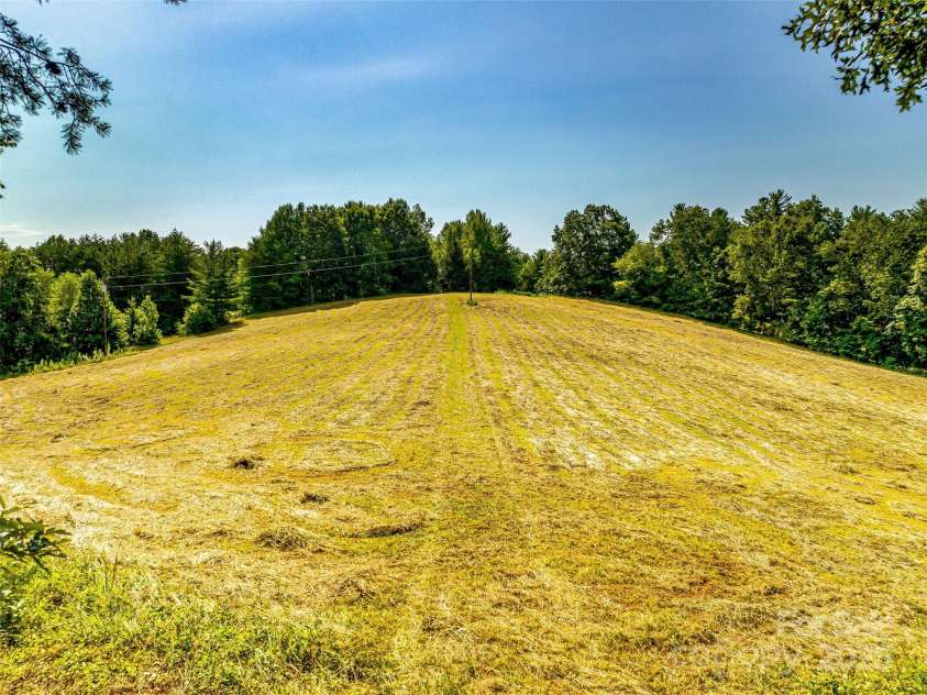 703 Crestview Drive, Leicester, NC 28748.  MLS# CAR4055999, YatesRealty ID 2568. Enjoy several rolling areas of pastures throughout the property. Excellent equestrian potential!