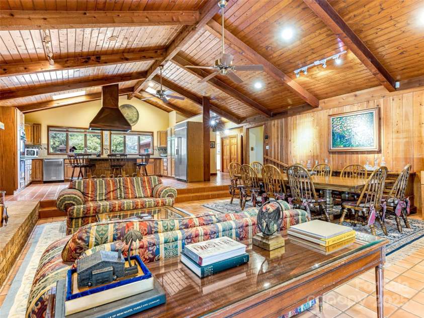 703 Crestview Drive, Leicester, NC 28748.  MLS# CAR4055999, YatesRealty ID 2568. European Farm House Style with dual flanking fireplaces overlooking views and mature maple trees