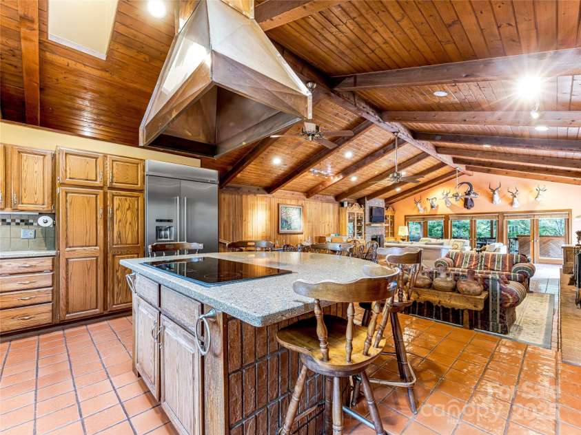 703 Crestview Drive, Leicester, NC 28748.  MLS# CAR4055999, YatesRealty ID 2568. Great Cooking Hood and professional series appliances