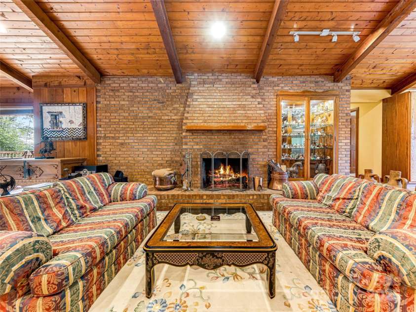 703 Crestview Drive, Leicester, NC 28748.  MLS# CAR4055999, YatesRealty ID 2568. Great Sitting and Entertaining Areas throughout