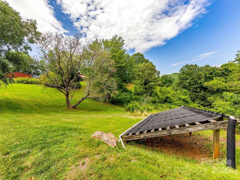 703 Crestview Drive, Leicester, NC 28748.  MLS# CAR4055999, YatesRealty ID 2568. Naturally Heated Water Circulation System for Pool