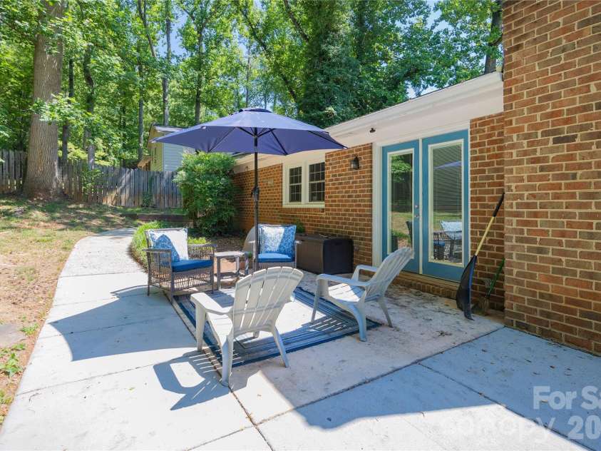 13 Mayflower Lane, Lexington, NC 27295.  MLS# CAR4385595, YatesRealty ID 25685. Back patio