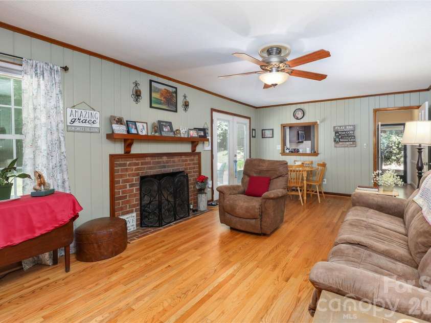13 Mayflower Lane, Lexington, NC 27295.  MLS# CAR4385595, YatesRealty ID 25685. Den with gas logs