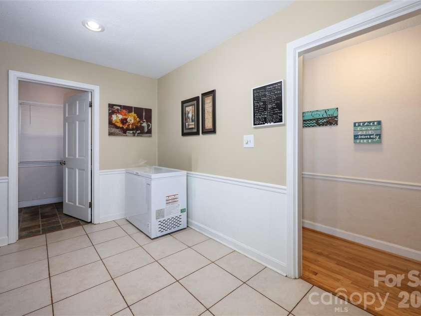 13 Mayflower Lane, Lexington, NC 27295.  MLS# CAR4385595, YatesRealty ID 25685. Kitchen with entry to laundry