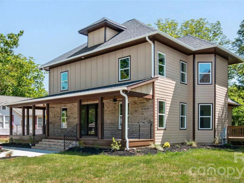 211 Tournament Drive, Concord, NC 28025.  MLS# CAR4377348, YatesRealty ID 25690. Front Side View