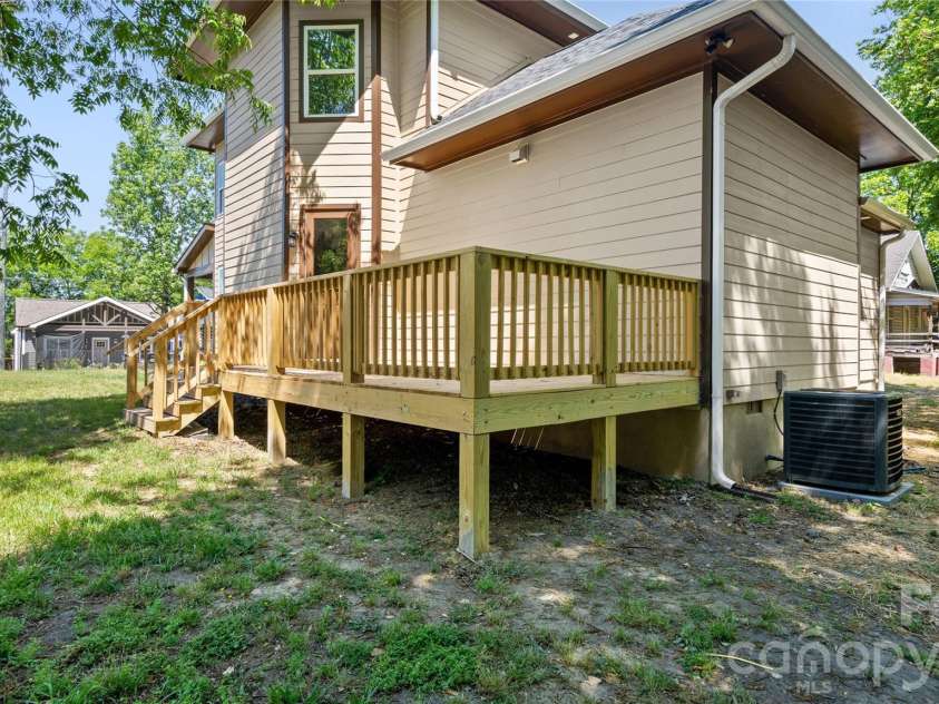 211 Tournament Drive, Concord, NC 28025.  MLS# CAR4377348, YatesRealty ID 25690. Side Deck