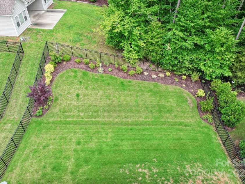 219 Broadleaf Drive, Denver, NC 28037.  MLS# CAR4265284, YatesRealty ID 25691. Aerial view of the large back yard