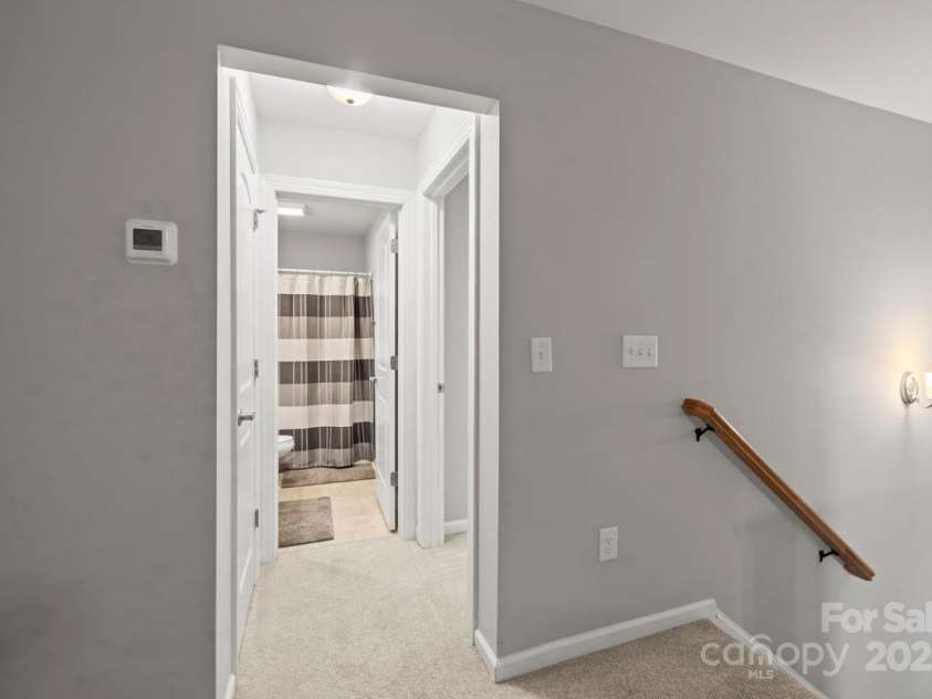 219 Broadleaf Drive, Denver, NC 28037.  MLS# CAR4265284, YatesRealty ID 25691. Ascend upstairs to find two additional bedrooms, a full bath and a loft