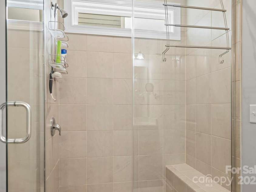 219 Broadleaf Drive, Denver, NC 28037.  MLS# CAR4265284, YatesRealty ID 25691. Enjoy the upgraded tile shower with built in seat