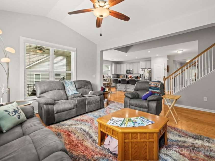 219 Broadleaf Drive, Denver, NC 28037.  MLS# CAR4265284, YatesRealty ID 25691. Enjoy the view of the back yard and covered porch from the family room