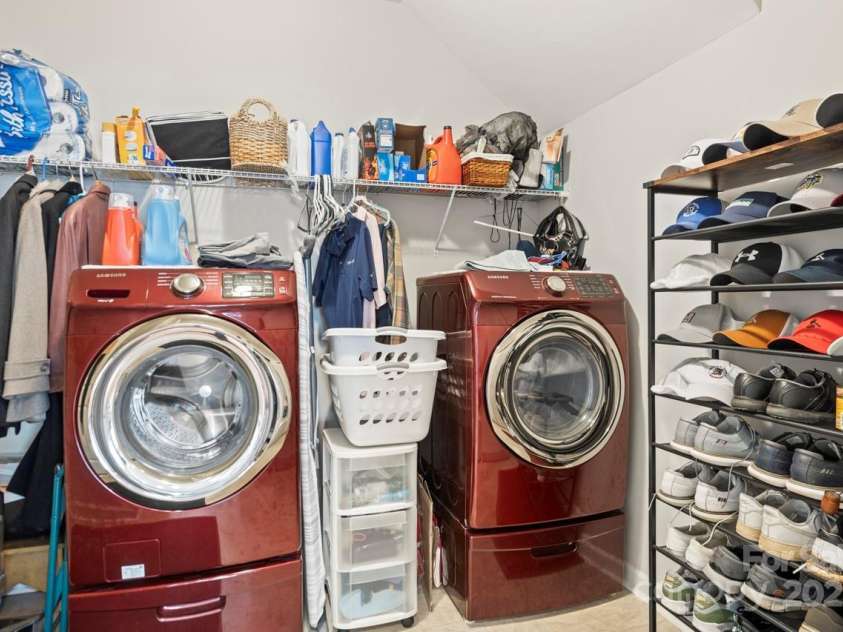 219 Broadleaf Drive, Denver, NC 28037.  MLS# CAR4265284, YatesRealty ID 25691. Large laundry room on the main level
