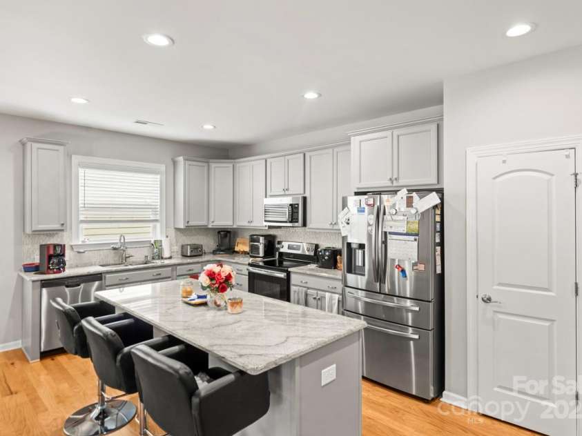 219 Broadleaf Drive, Denver, NC 28037.  MLS# CAR4265284, YatesRealty ID 25691. Stainless steel appliances and a fashionable tile back splash are additional features