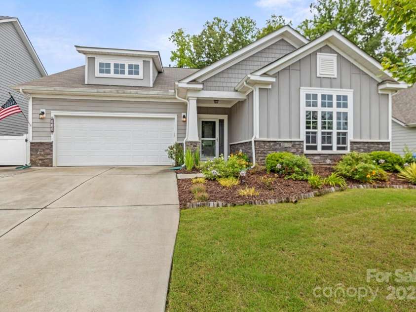219 Broadleaf Drive, Denver, NC 28037.  MLS# CAR4265284, YatesRealty ID 25691. Stone accents, craftsman details, and a welcoming front porch make 219 Broadleaf Drive stand out