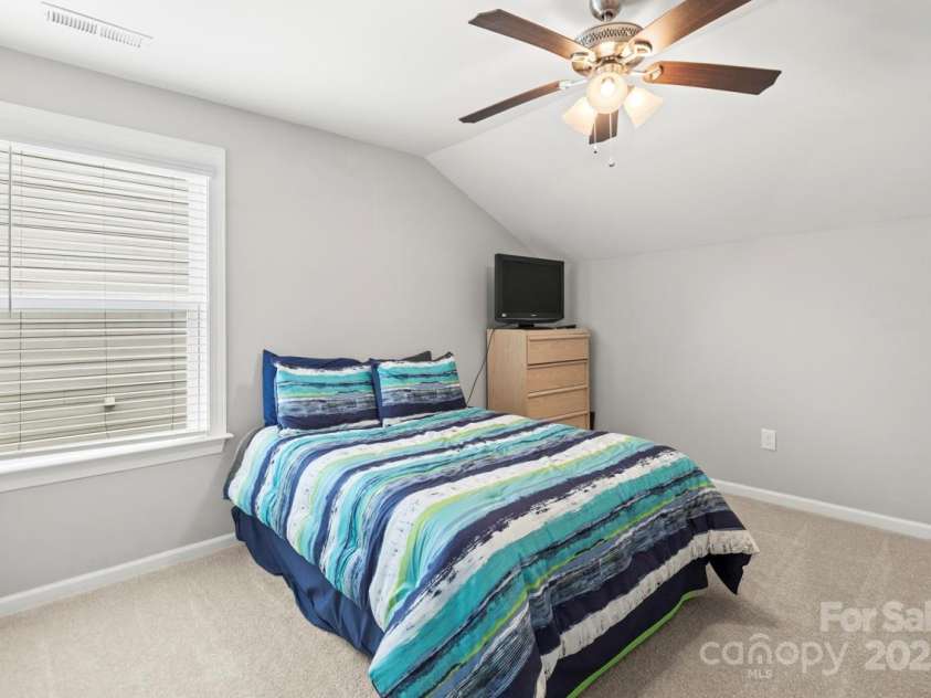 219 Broadleaf Drive, Denver, NC 28037.  MLS# CAR4265284, YatesRealty ID 25691. The fourth bedroom completes the upper level of the home