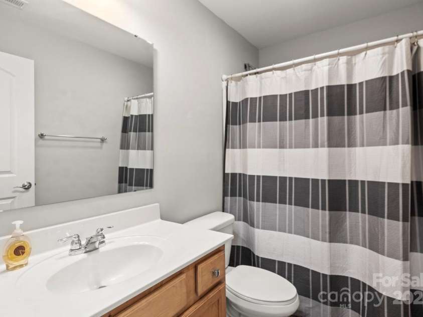 219 Broadleaf Drive, Denver, NC 28037.  MLS# CAR4265284, YatesRealty ID 25691. The full bathroom on the upper level make this home ideal for guests or multi-generational living