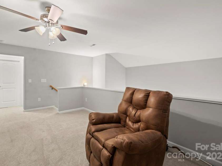 219 Broadleaf Drive, Denver, NC 28037.  MLS# CAR4265284, YatesRealty ID 25691. The versatile loft can be used as a separate living area