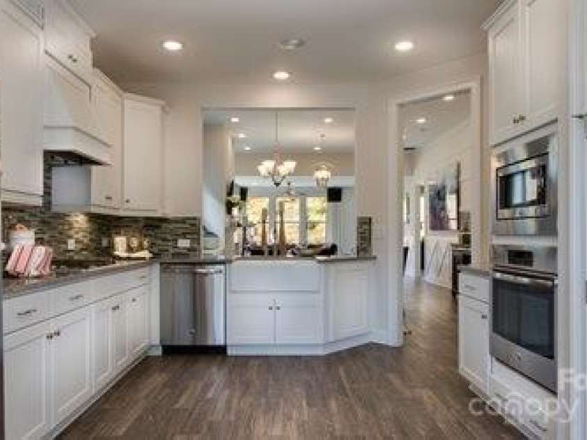 8414 Profit Lane, Charlotte, NC 28215.  MLS# CAR4280131, YatesRealty ID 25696. Model photos used for reference