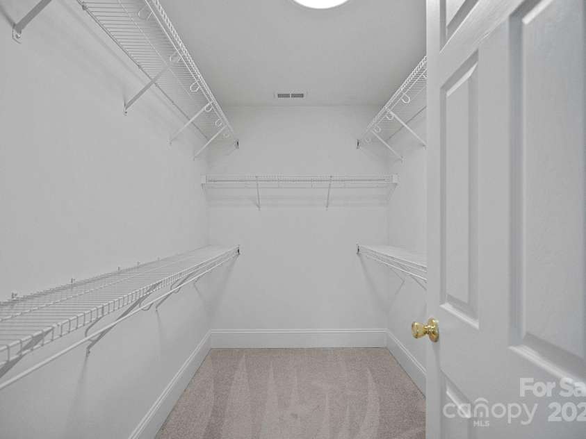 7478 Pine Ridge Drive, Denver, NC 28037.  MLS# CAR4272908, YatesRealty ID 25697. Spacious walk-in primary closet.