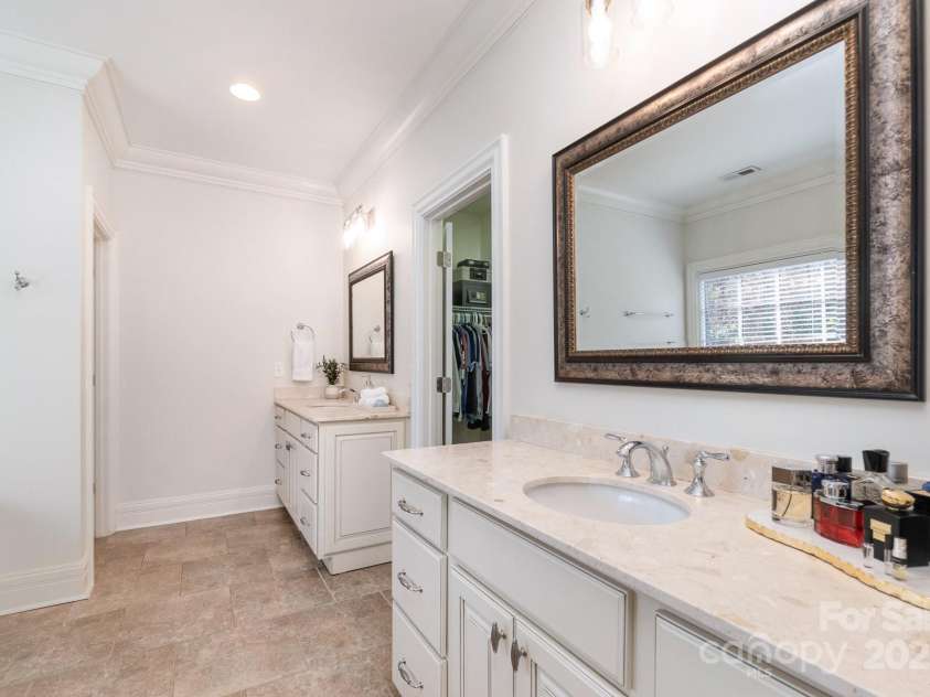 6411 Aldworth Lane, Charlotte, NC 28226.  MLS# CAR4287812, YatesRealty ID 25699. Double vanity with Compac stone counters