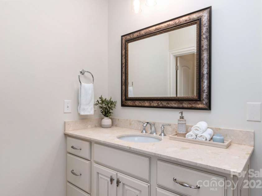 6411 Aldworth Lane, Charlotte, NC 28226.  MLS# CAR4287812, YatesRealty ID 25699. Framed out mirrors in every bathroom