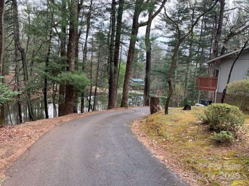 101 LAKEMONT Drive, Flat Rock, NC 28731.  MLS# CAR4246456, YatesRealty ID 257. 